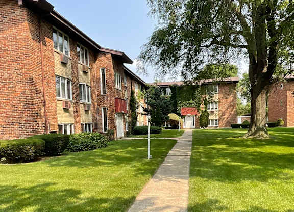 Walkways along buildings and grass at The Countryside, Countryside ?