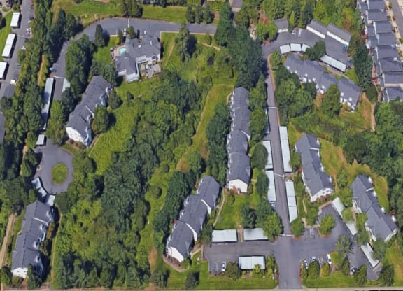 an aerial view of a neighborhood with houses and trees at Murrayhill Park, Beaverton, 97008