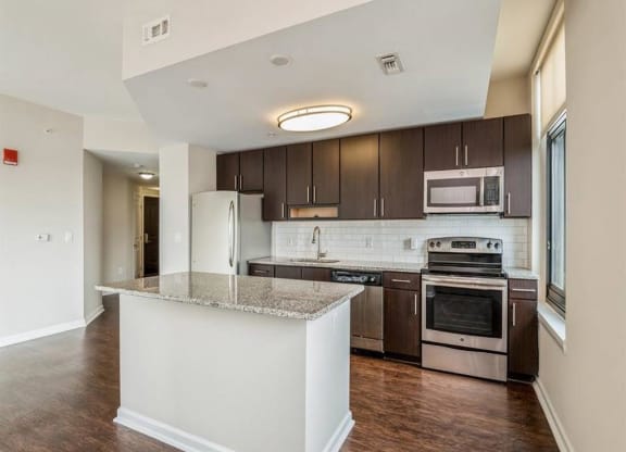 Kitchen with cabinets at Arrive Wheaton, Wheaton
