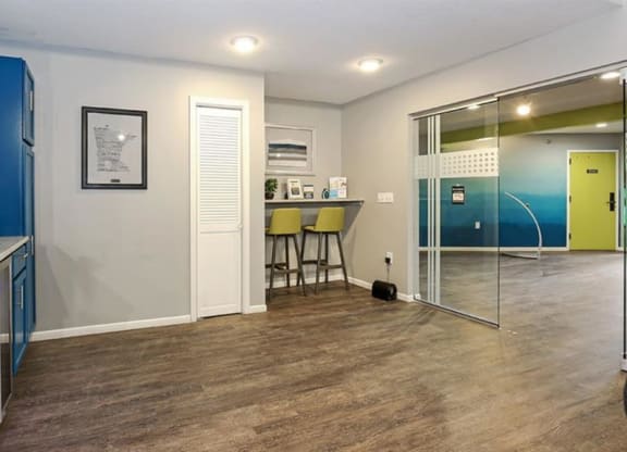 Clubhouse interior with white and blue wall colors at Twelve 501 Apartment Homes, Burnsville, MN