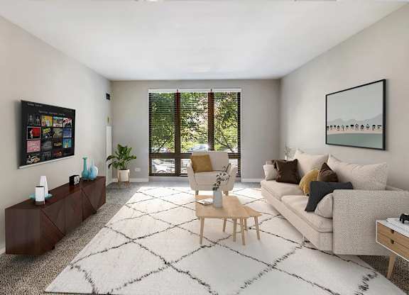 A living room with a couch, chair, and a rug. at Oak Park City, Illinois, 60301