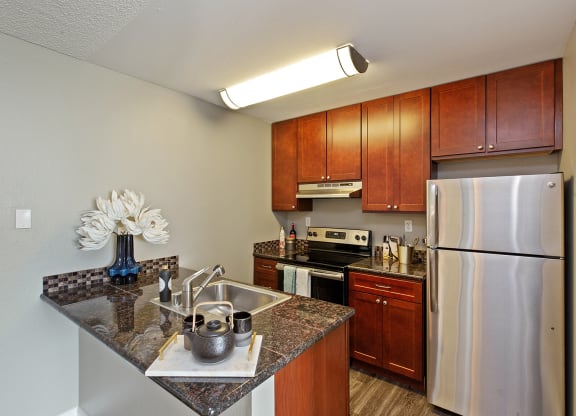Kitchen interior view at OceanAire Apartment Homes, Pacifica, CA