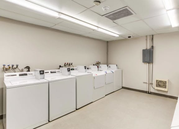a large laundry room with washers and dryers  at ReNew at Neill Lake, Minnesota