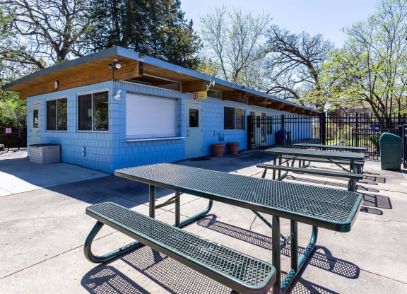 our picnic tables are conveniently located in front of the building  at ReNew at Neill Lake, Eden Prairie, Minnesota