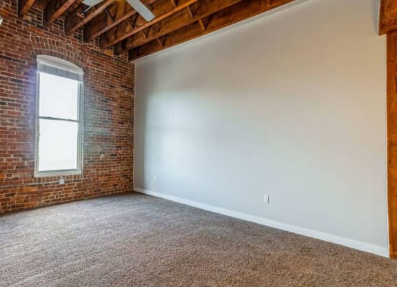 Unfurnished living room at Rocket Transfer Lofts, Iowa, 50309