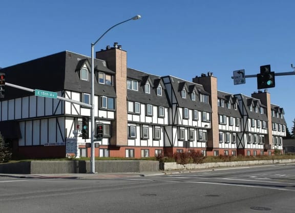 a new building on the corner of a street with a traffic light at Kings Court, Anchorage, AK ?