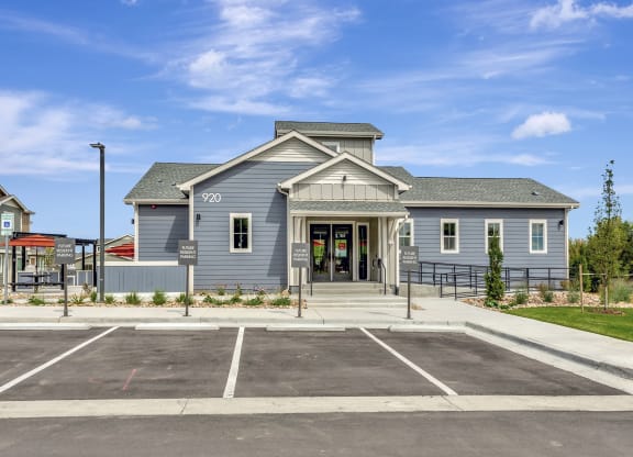 Front of leasing center with plenty of parking