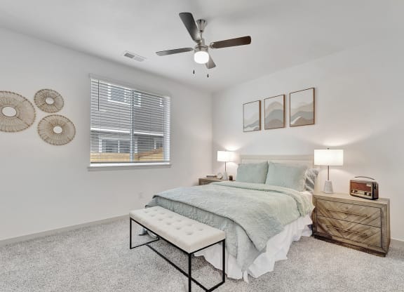 Bedroom with a bed and a ceiling fan
