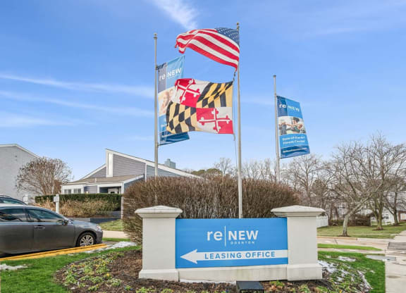 a sign in front of a house that says leasing office at ReNew Odenton, Maryland