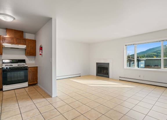 a living room along with kitchen at ReNew Eagle River, Eagle River, AK