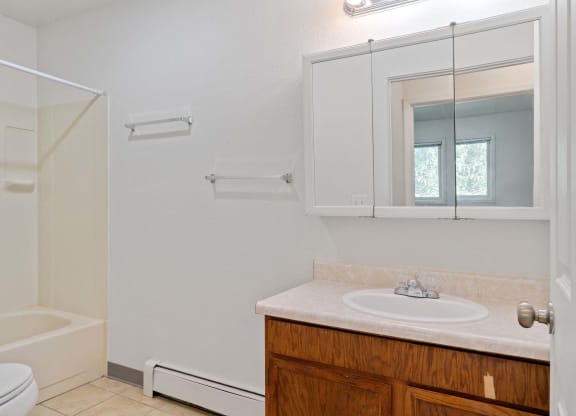 a bathroom with a sink toilet and shower at ReNew Eagle River, Eagle River, Alaska