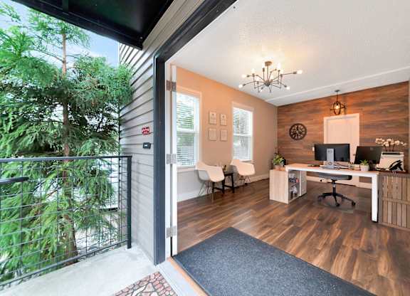 Leasing office with desk and chairs at River Lofts Apartments, Tualatin 97062