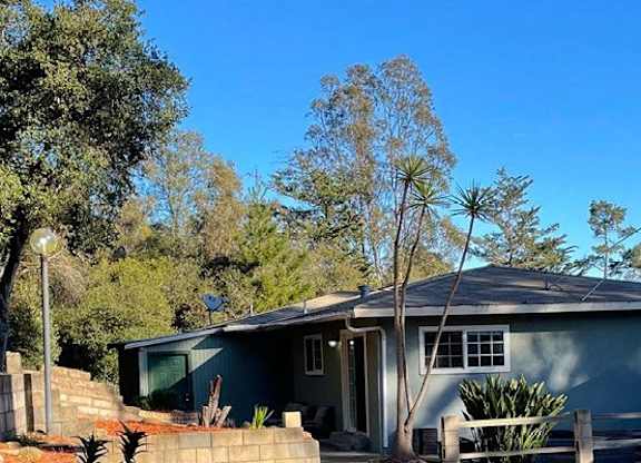 house surrounded by trees at Salinas Sunset Apartments, Salinas