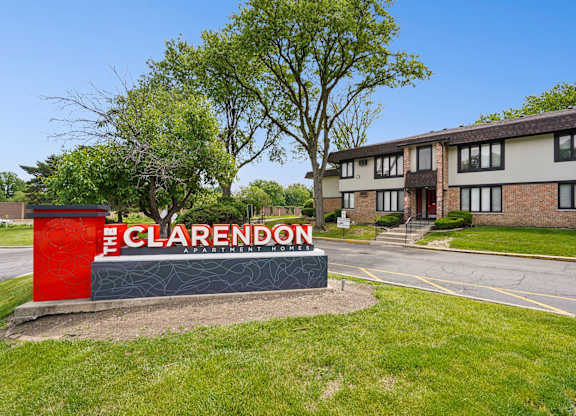The Clarendon sign is in front of a building.