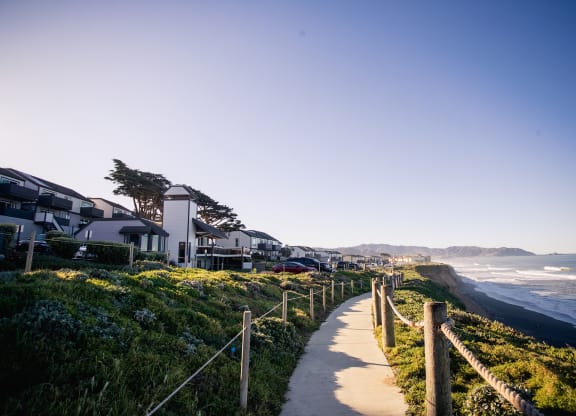 Pathway along the beach cliffs with Oceanaire on the left