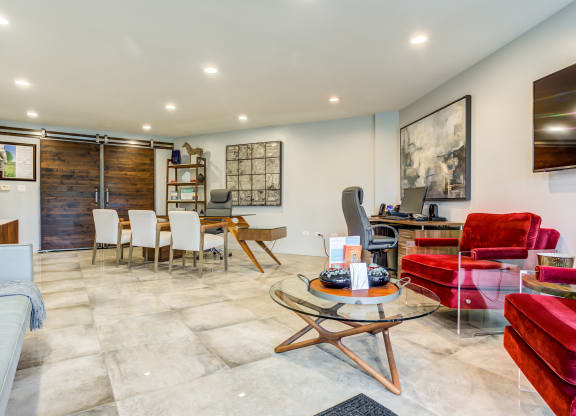 a living and dining room area with a desk and chairs and a couchat The Township at St. Charles, Illinois, 60174