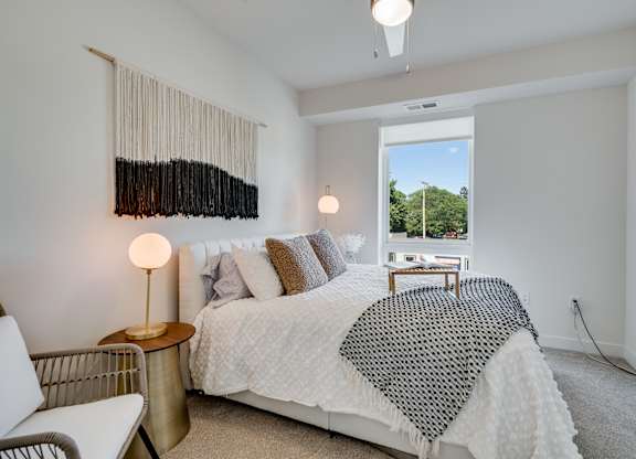 bedroom with a large bed and a chair at The Shale, Minnesota