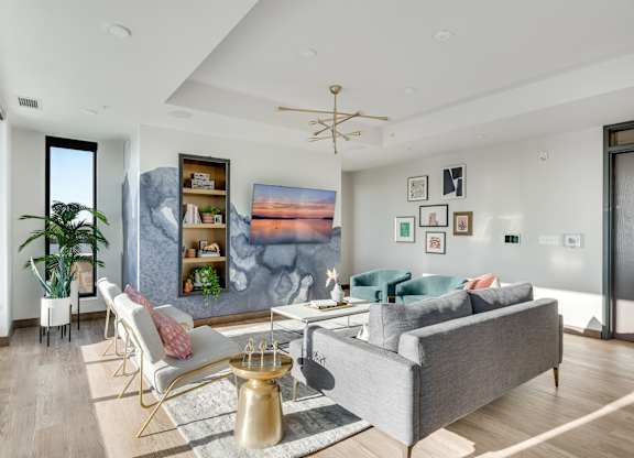 modern room with gold floor lamp at The Shale, Minneapolis, 55406