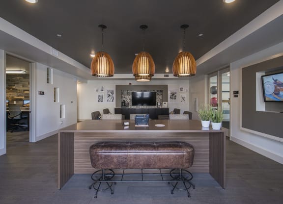 a view of the lobby of a hotel with a bar and a tv at Arrive Los Carneros Apartments, Goleta