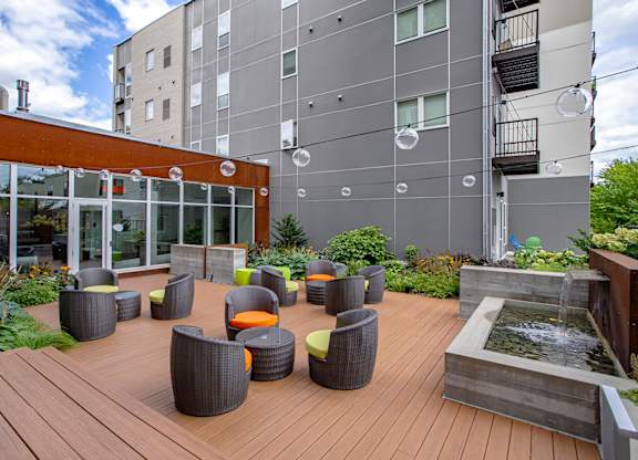 Outdoor Lounge with water fountain at Track 29 Apartments, Minneapolis