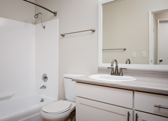 Bathroom with a sink toilet and shower