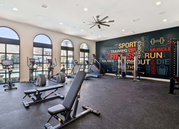 Gym with treadmills and weights at Arrive Temecula