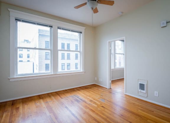 apartment interior with hardwood floors and city views at Maurice Dear Apartments, Oregon, 97205