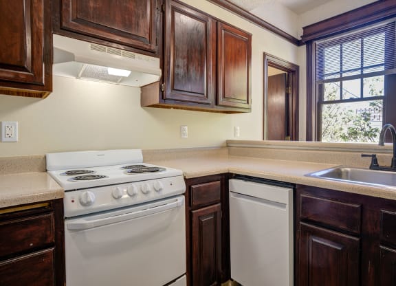 a kitchen with a stove, dishwasher, sink and a window at Whitney Gray, Oregon ?