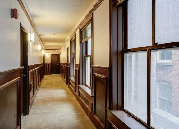 a hallway with large windows and a wood floor at Whitney Gray, Portland, OR 97205 ?