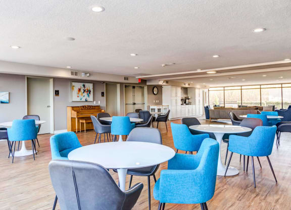 a large room with tables and chairs