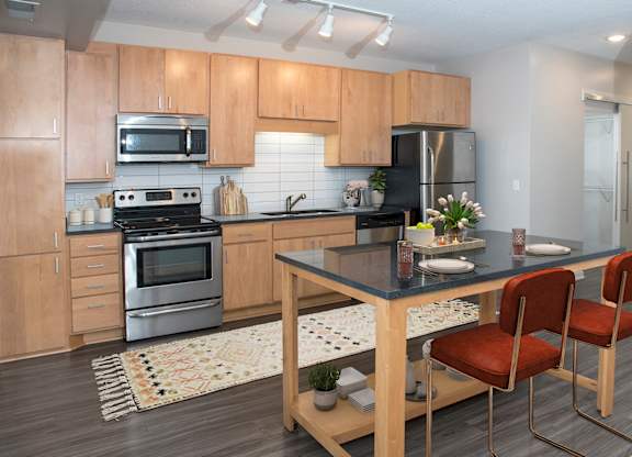 Kitchen with Stove top oven at Zest, Minneapolis