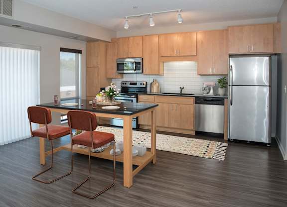 Kitchen with appliances at Zest, Minnesota, 55419