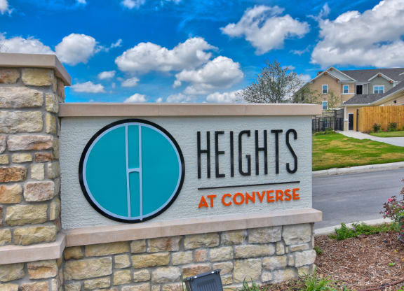 heights at converse apartments entrance sign