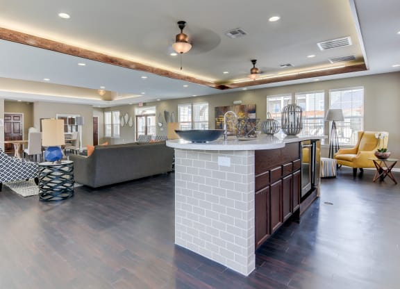inside of the heights at converse apartments leasing center entertaining area
