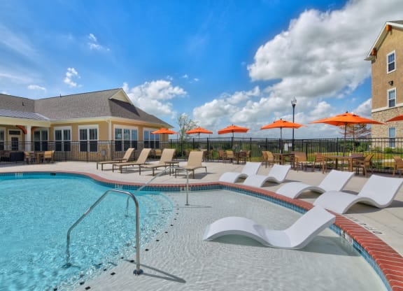 heights at converse apartments pool sun deck with lounge chairs