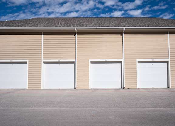 A building with four garage doors.