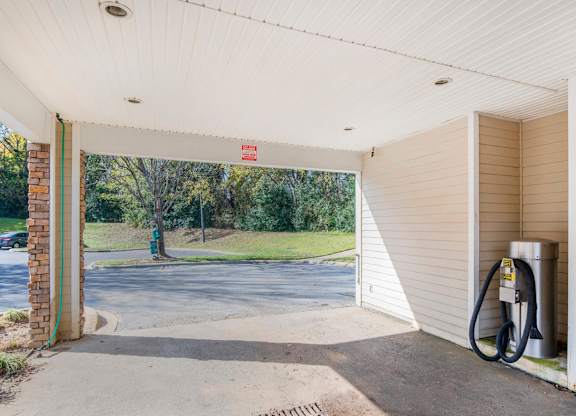 A charging station is installed in a garage.
