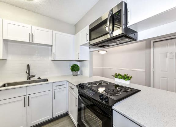 White renovated kitchen at Veridian at Sandy Springs apartments