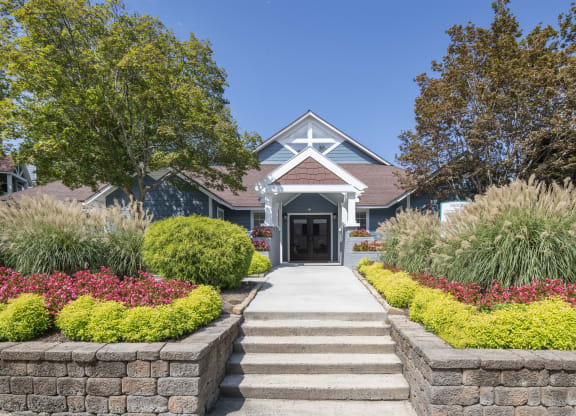 a house with a garden in front of it