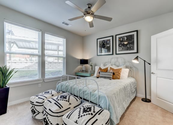 Model Bedroom with Ceiling Fan and Connecting Bathroom