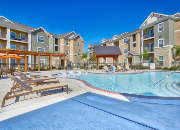 heights at converse apartments in texas pool area with lounge seating