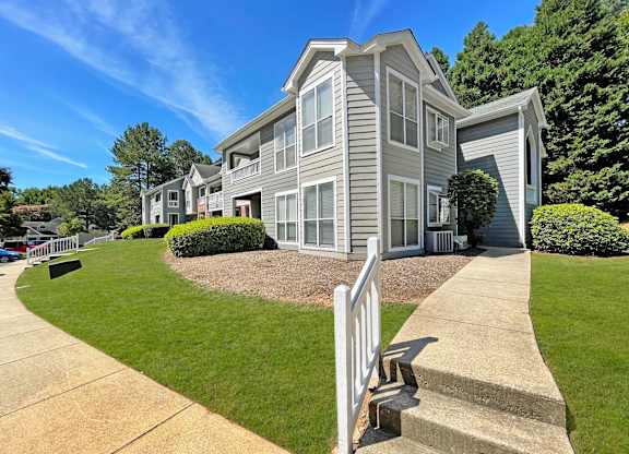 Grey Building Exterior at Lexington Farms Apartment Homes in Raleigh, NC