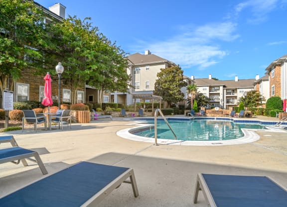 the preserve at ballantyne commons pool with apartment buildings