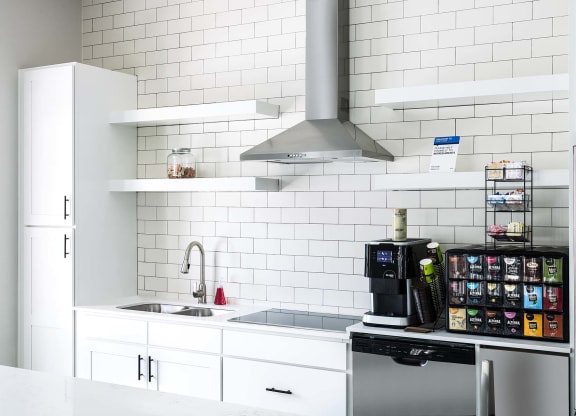 Leasing Center clubhouse modern kitchen at Whitehall Estate apartments in Charlotte NC