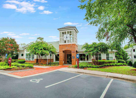 the entrance to leasing office at the Seasons at Umstead apartments in Raleigh