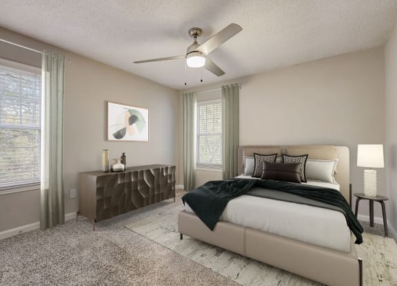 Sandy Springs, GA Pet-Friendly Apartments - Veridian at Sandy Springs - Bedroom with a Ceiling fan, Plush Carpet Flooring, and Large Windows