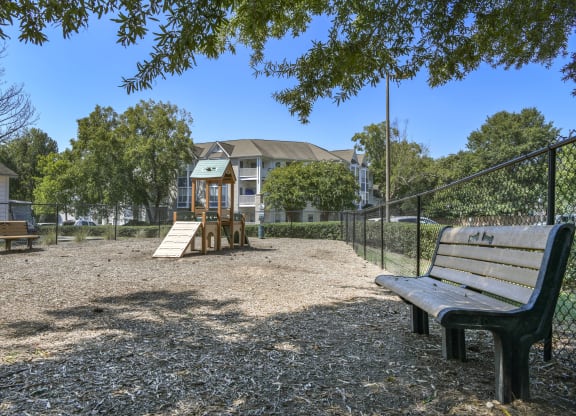 a playground at the whispering winds apartments in pearland, tx