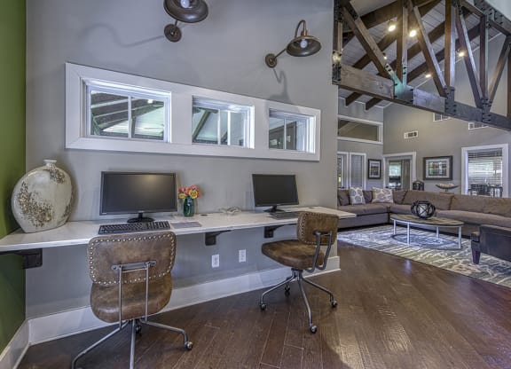 office computers station with two desks and two computer monitors at Wynnwood Vinings Leasing center Tamarron Pkwy SE Atlanta GA