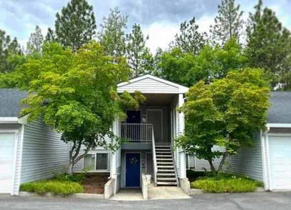 A house with a blue door and a porch.