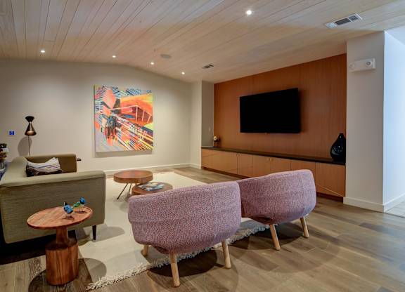 Clubhouse Living Room with pink chairs at Agave, San Antonio, TX, 78205
